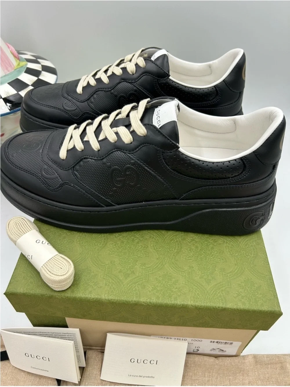 Men’s Gucci GG embossed black leather sneakers size 10 fits 10.5 US made Italy